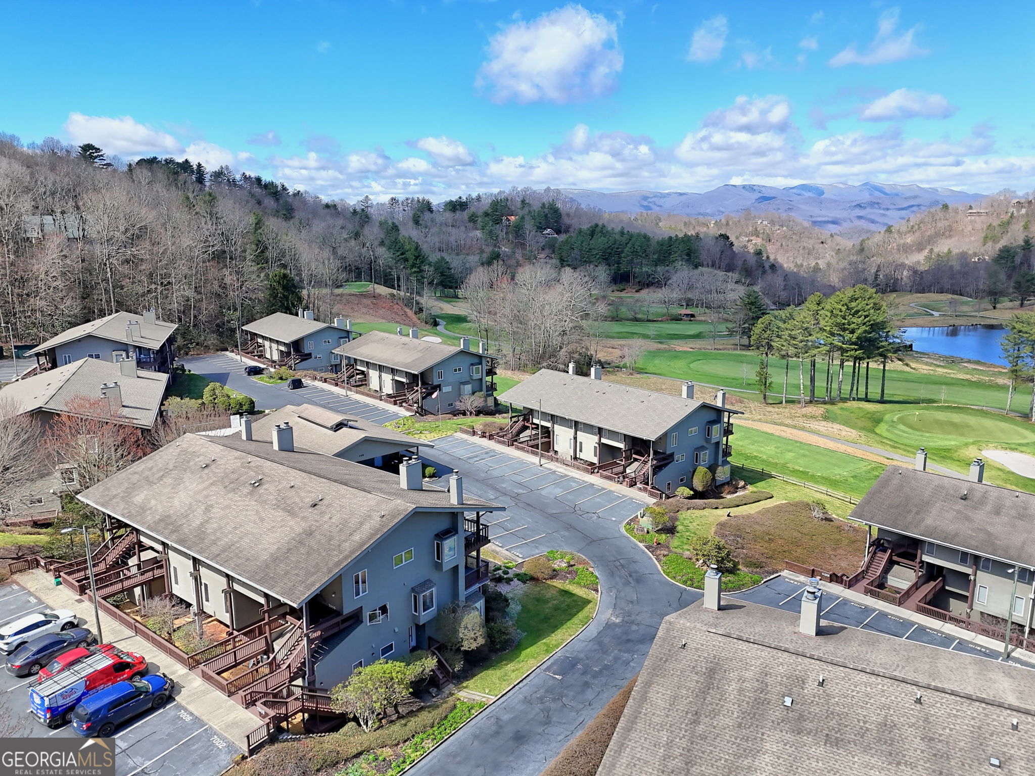 62 Sunvalley Circle, Unit 7006 Dillard, GA 30537 - Photo 53 of 55 an aerial view of a house with garden space and street view