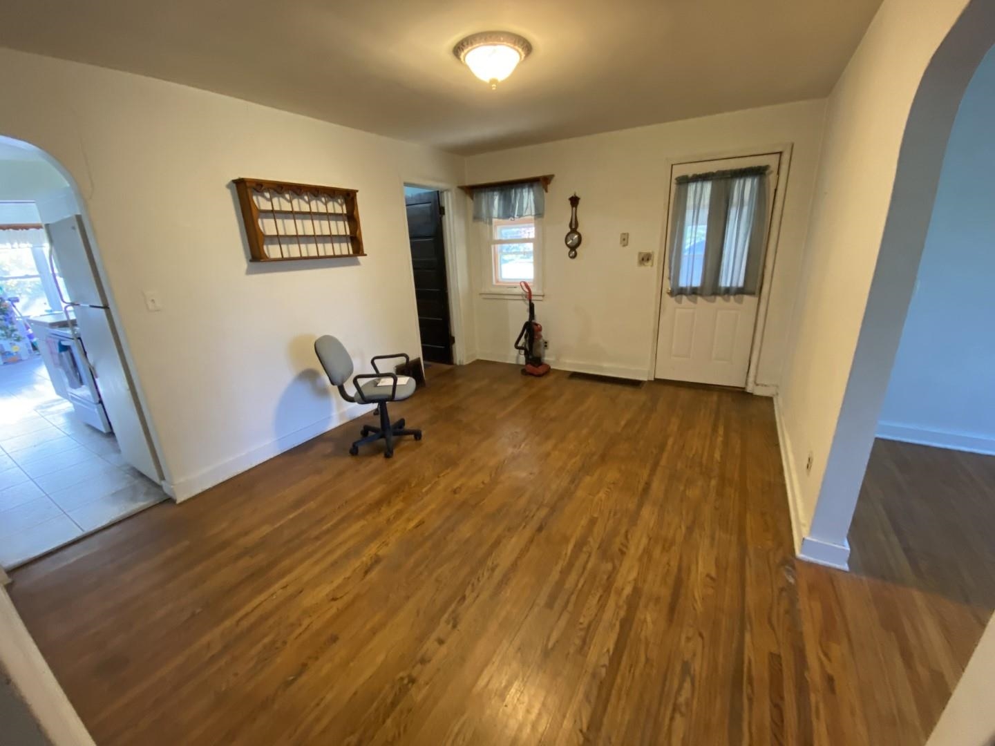 10361 Becker Road Savanna, IL 61074 - Photo 21 of 23 a view of a room with wooden floor and windows