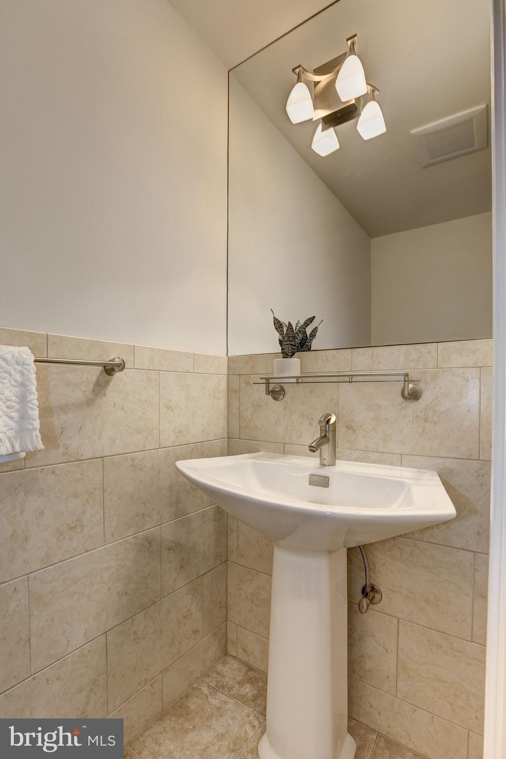 8316 Rising Ridge Way Bethesda, MD 20817 - Photo 20 of 45 Renovated Half Bath on Main Level