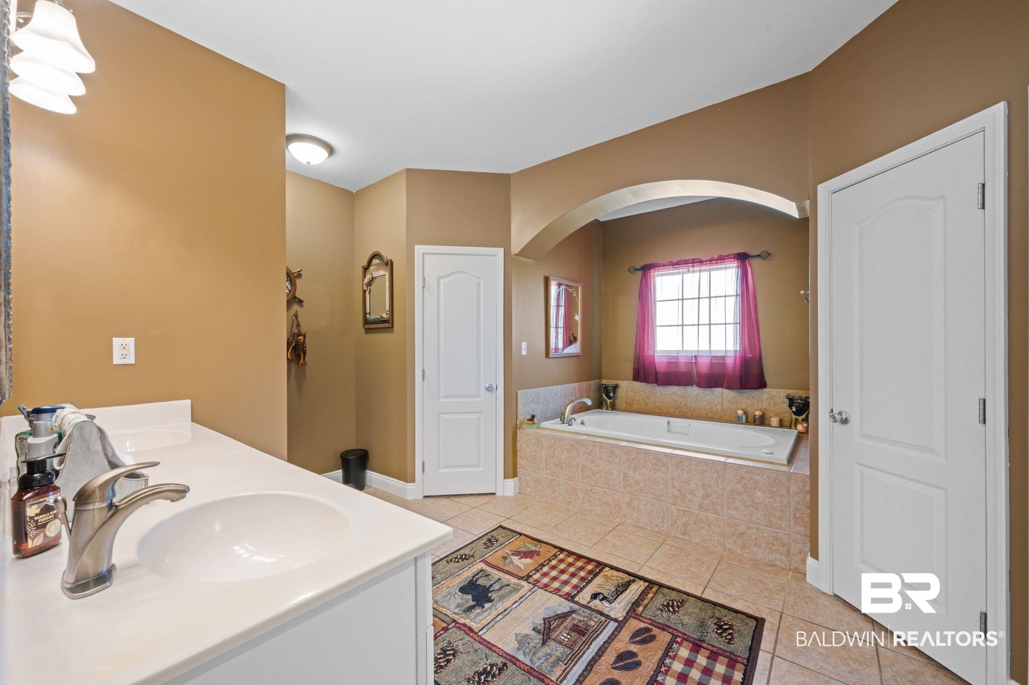 48513 Phillipsville Road Bay Minette, AL 36507 - Photo 22 of 50 Full bath featuring tile patterned flooring, a garden tub, and double vanity