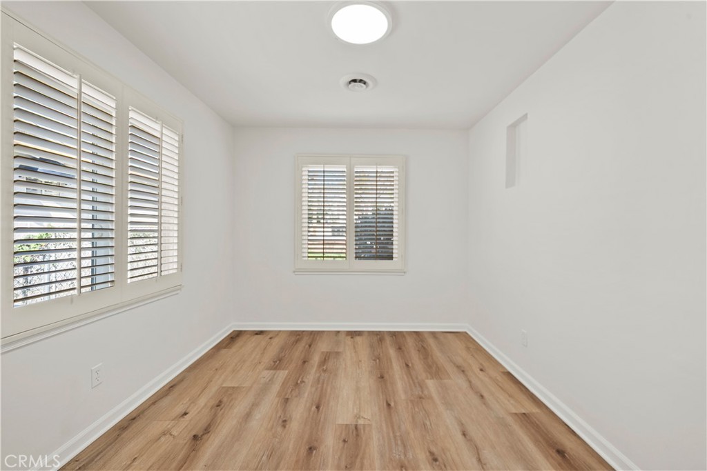 3318 Prospect Avenue La Crescenta, CA 91214 - Photo 12 of 42 a view of a room with wooden floor and windows