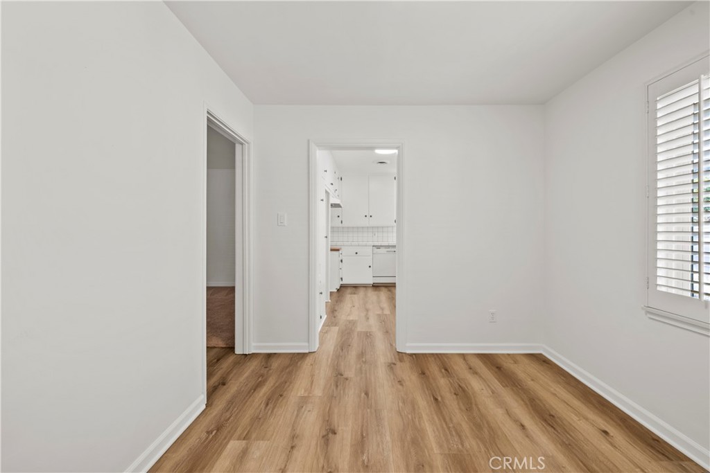 3318 Prospect Avenue La Crescenta, CA 91214 - Photo 14 of 42 an empty room with wooden floor and windows