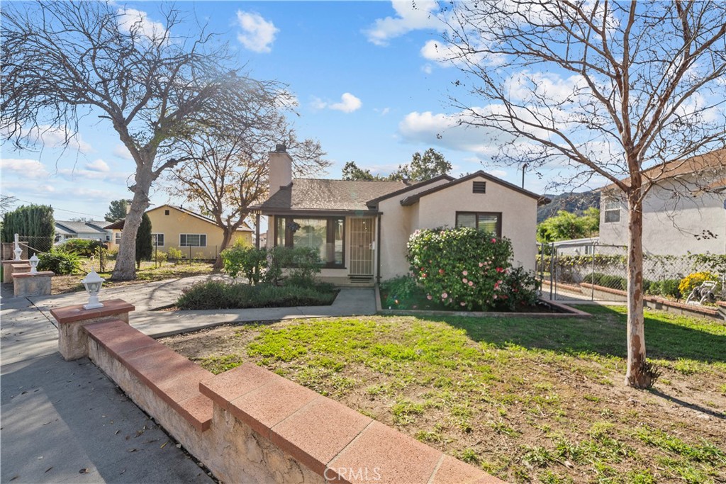 3318 Prospect Avenue La Crescenta, CA 91214 - Photo 2 of 42 a view of a white house with a big yard and large tree