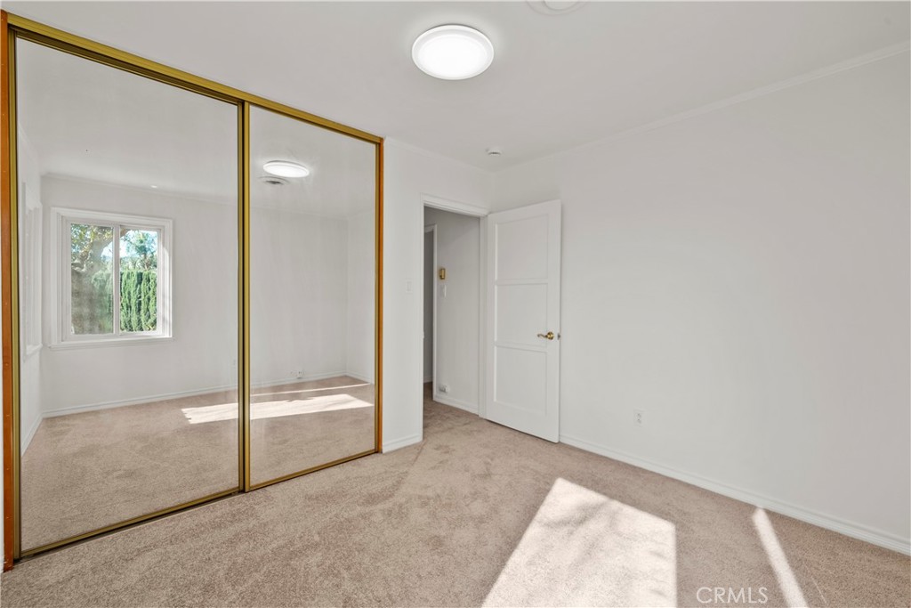 3318 Prospect Avenue La Crescenta, CA 91214 - Photo 21 of 42 an empty room with windows and closet