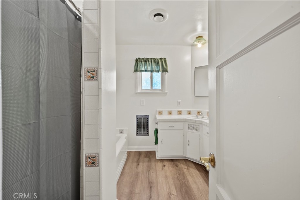 3318 Prospect Avenue La Crescenta, CA 91214 - Photo 22 of 42 a bathroom with a sink a mirror and a toilet
