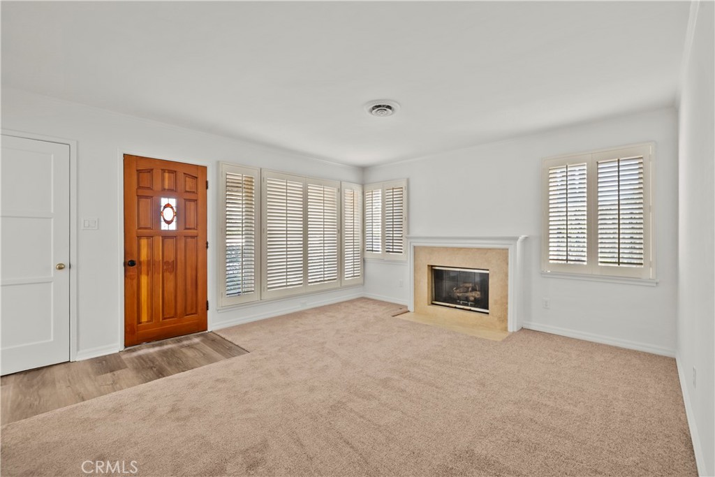 3318 Prospect Avenue La Crescenta, CA 91214 - Photo 9 of 42 an empty room with windows and fireplace