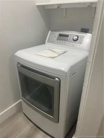 a utility room with washer and dryer