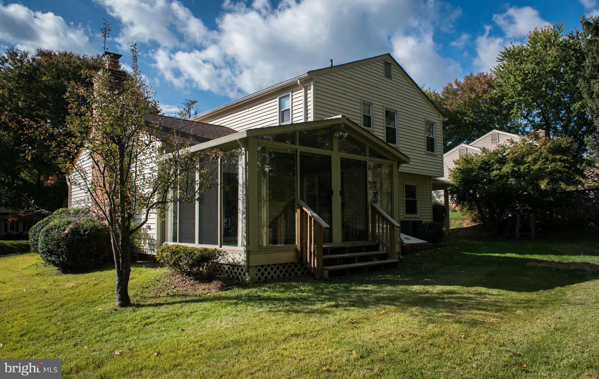 3213 Llewellyn Field Road Olney, MD 20832 - Photo 15 of 30 a view of a house with backyard and porch
