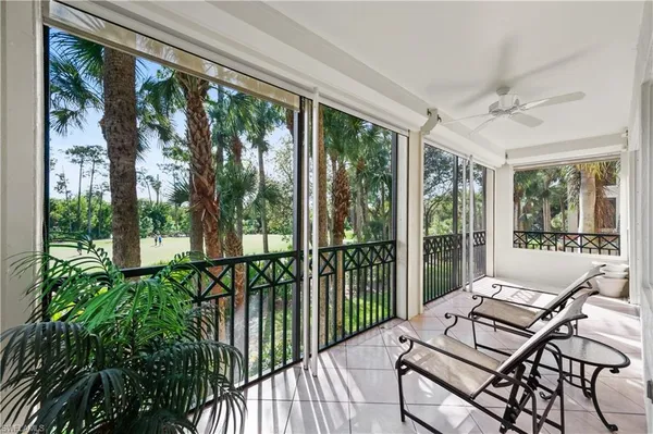 a balcony with furniture