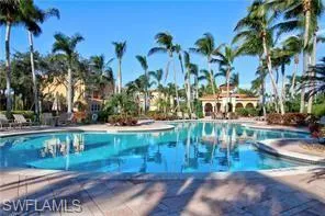 a view of a yard with palm trees