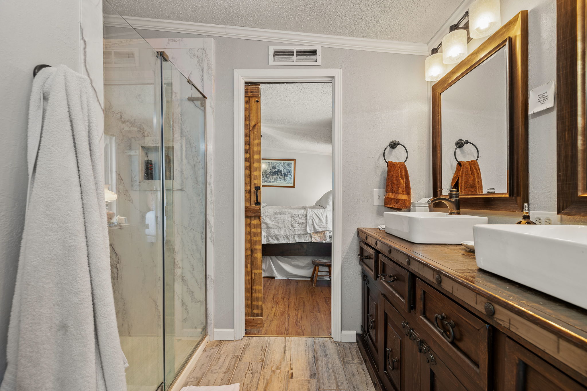 541 Hidden Oaks Drive Elgin, TX 78621 - Photo 13 of 40 Ensuite bathroom featuring a dual vanity and lots of upgrades