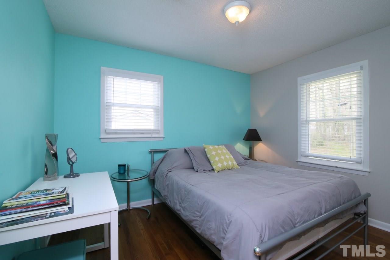 1501 Westchester Road Raleigh, NC 27610 - Photo 13 of 25 a bedroom with a bed and a window