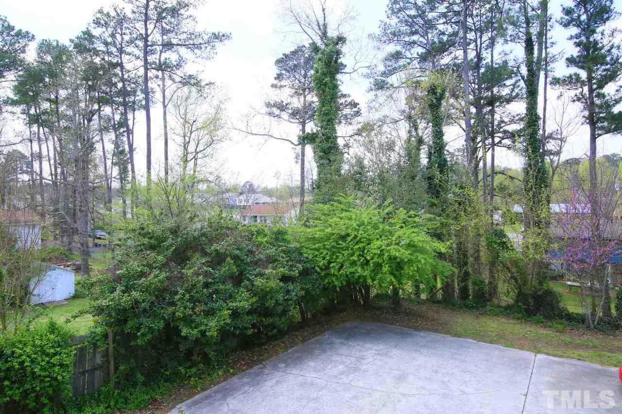1501 Westchester Road Raleigh, NC 27610 - Photo 24 of 25 a view of a garden with plants and trees