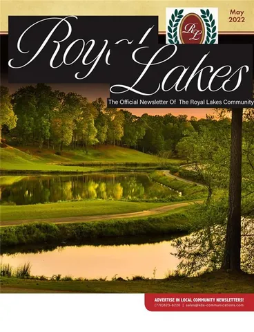 a view of a swimming pool with a yard