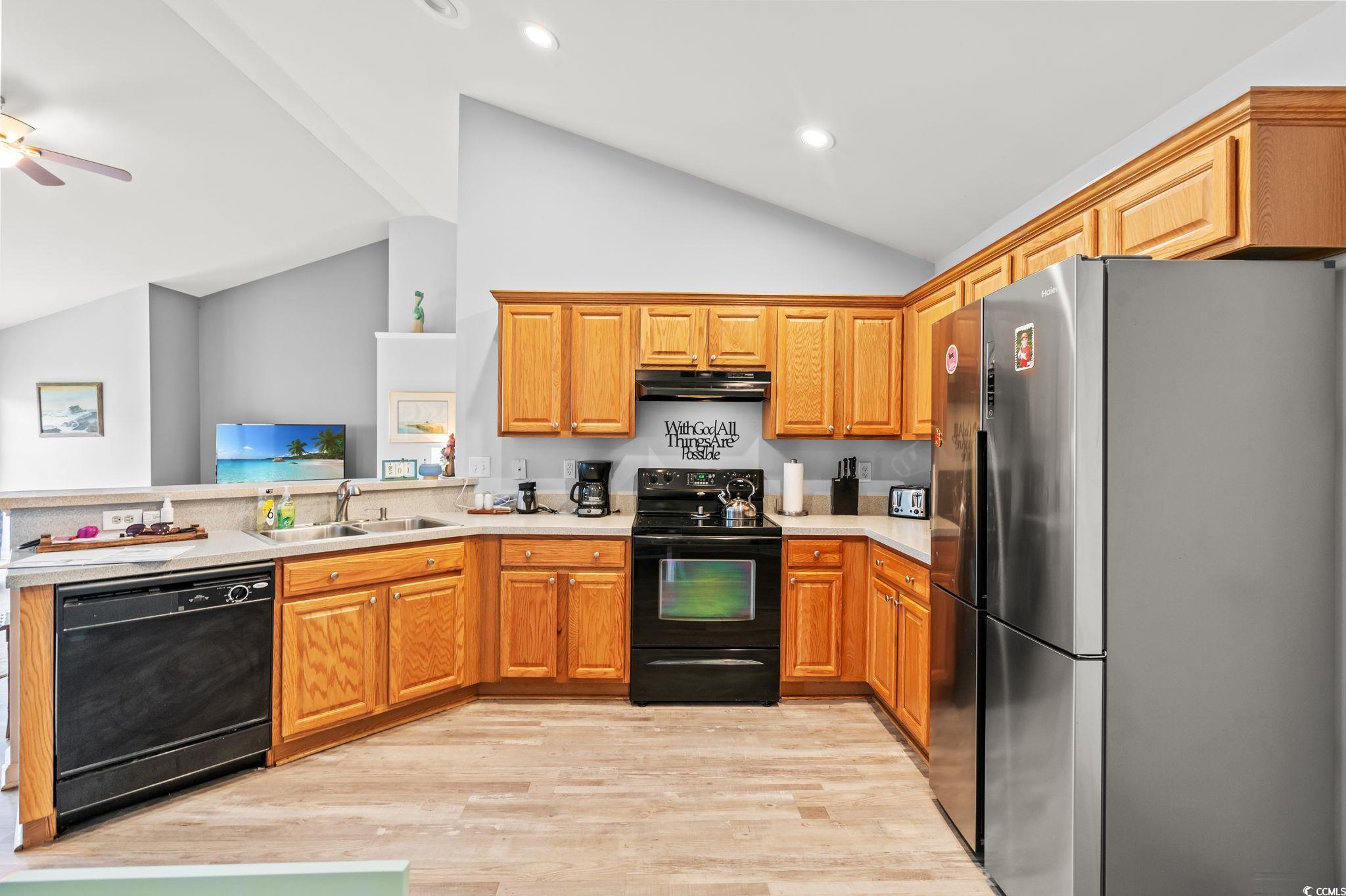232 Marbella Drive Murrells Inlet, SC 29576 - Photo 11 of 40 Kitchen featuring black appliances, under cabinet