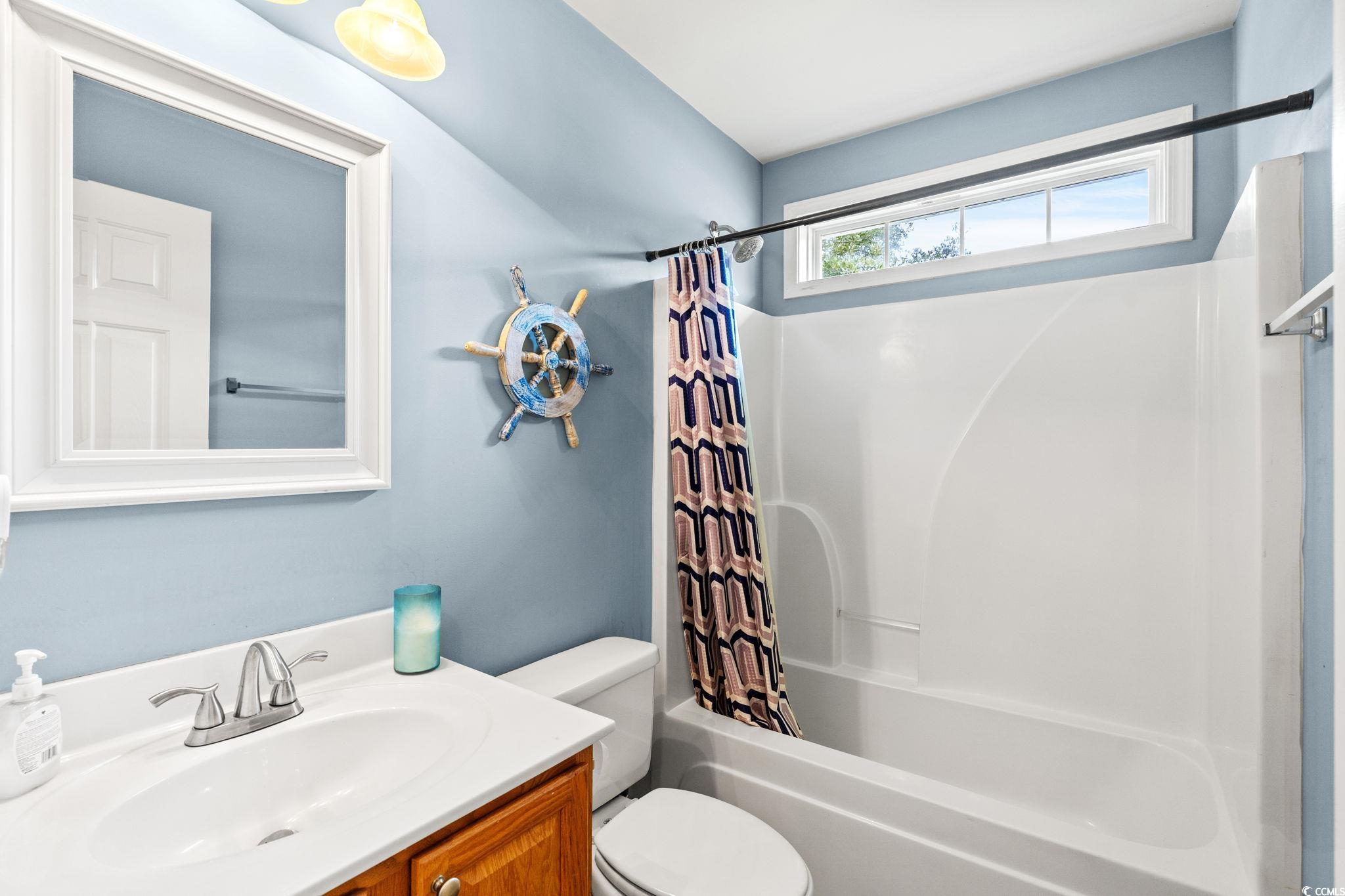 232 Marbella Drive Murrells Inlet, SC 29576 - Photo 19 of 40 Bathroom with vanity and shower / bath combo with