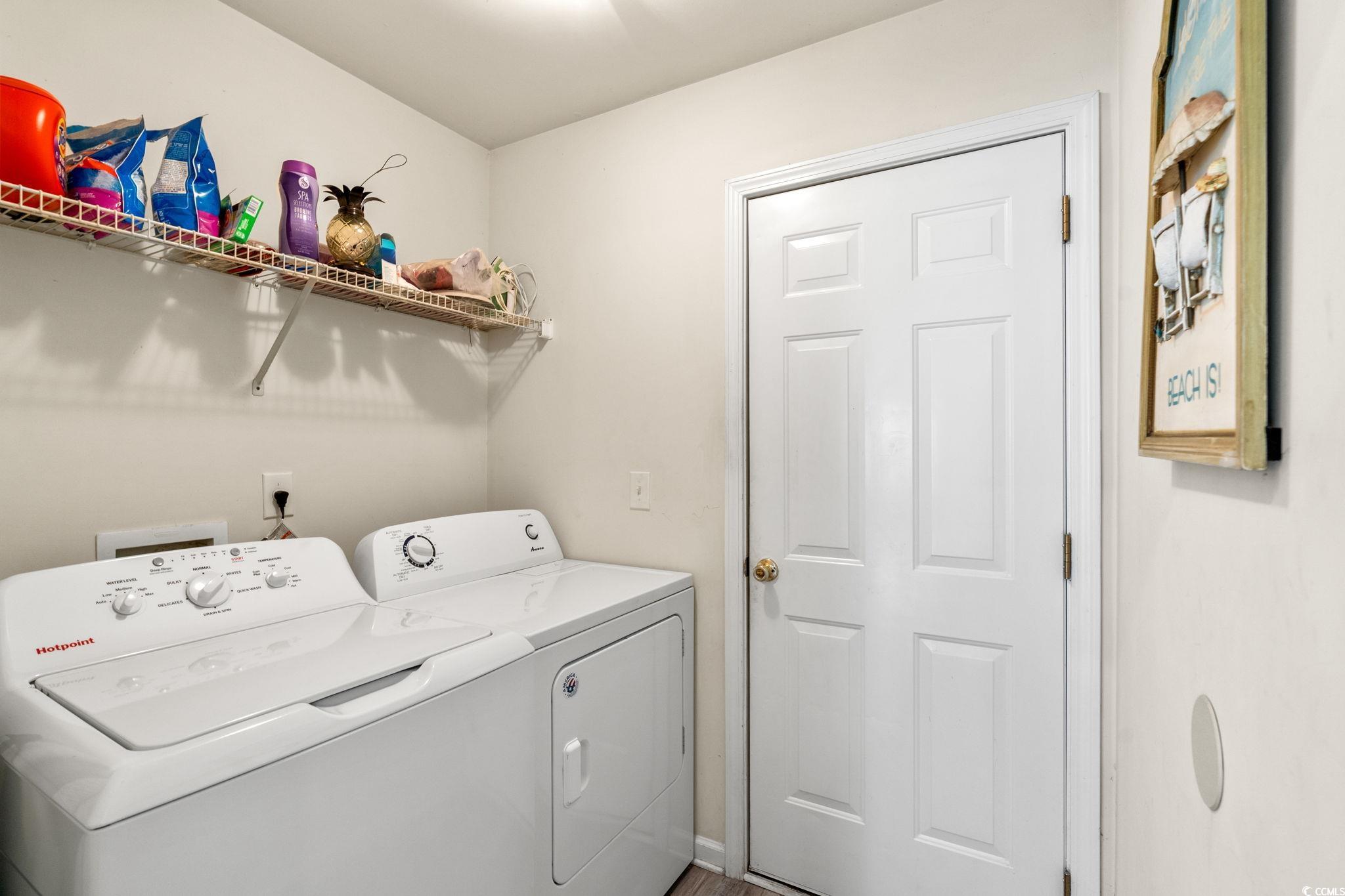 232 Marbella Drive Murrells Inlet, SC 29576 - Photo 21 of 40 Laundry room featuring washing machine and clothes