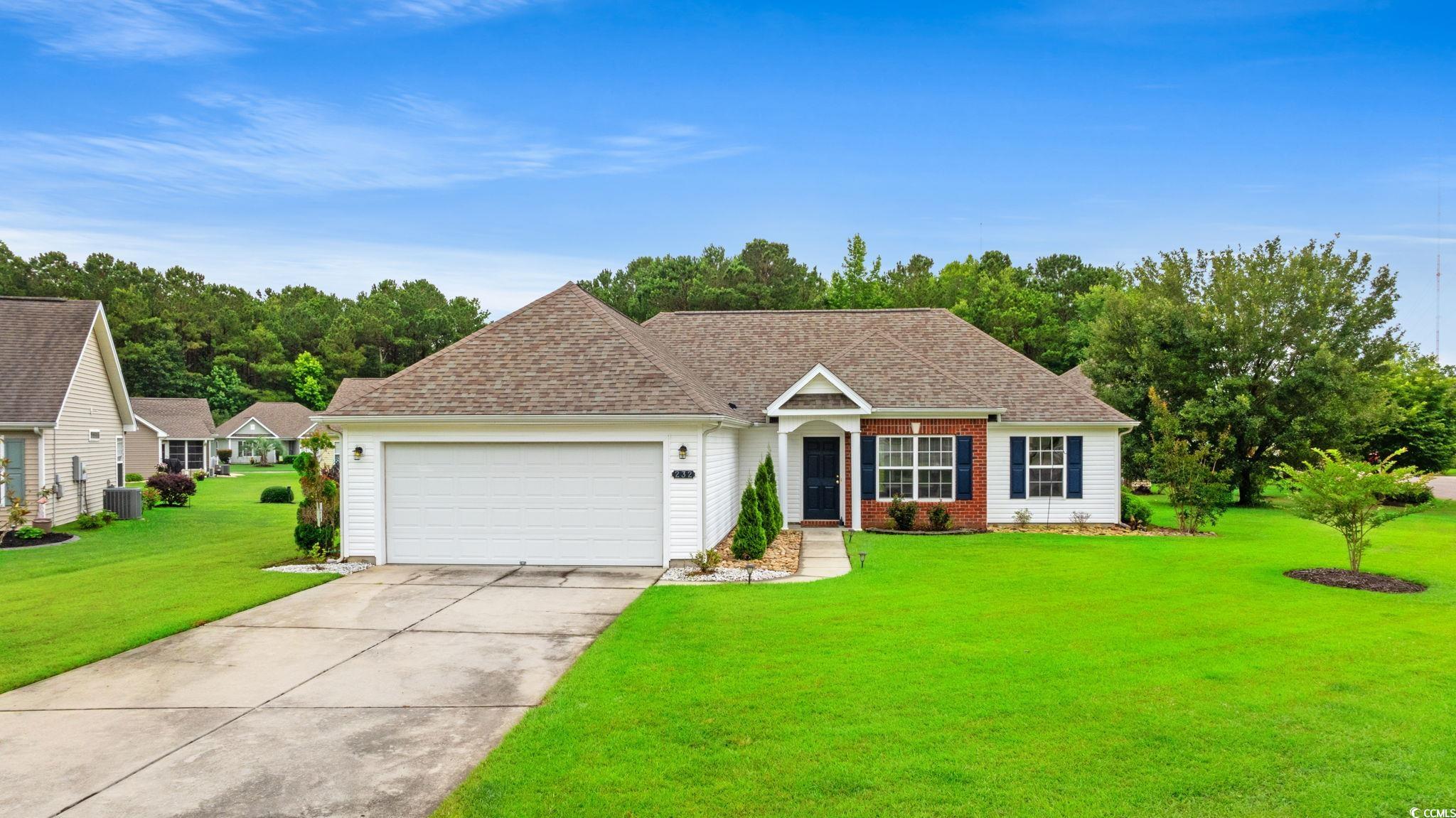 232 Marbella Drive Murrells Inlet, SC 29576 - Photo 30 of 40 View of front of property featuring a front yard,