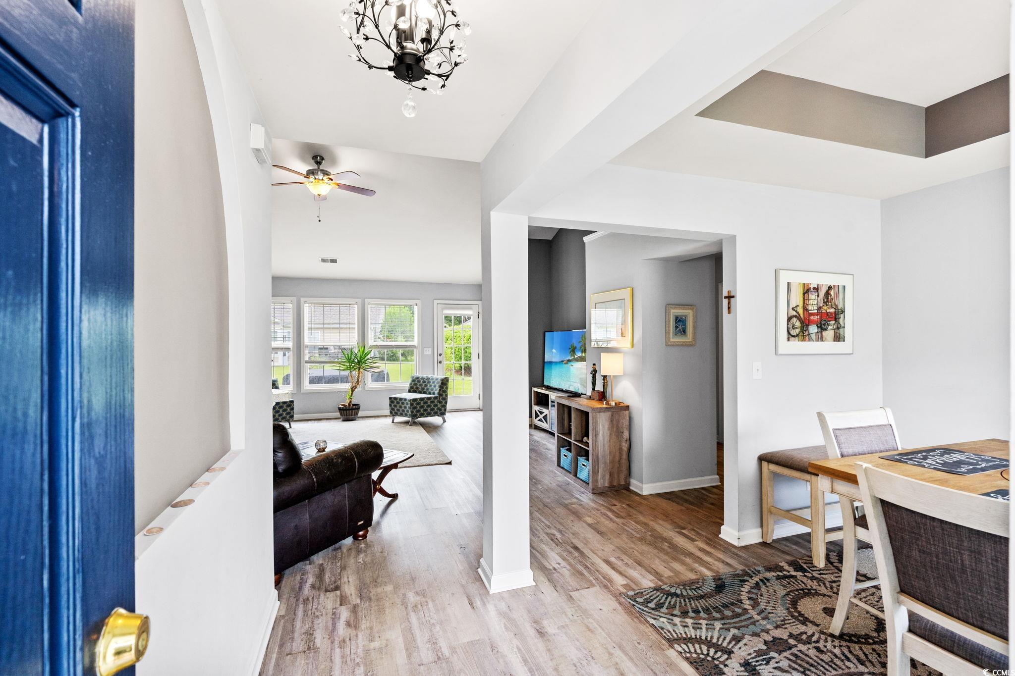 232 Marbella Drive Murrells Inlet, SC 29576 - Photo 3 of 40 Dining space featuring wood finished floors, a cei