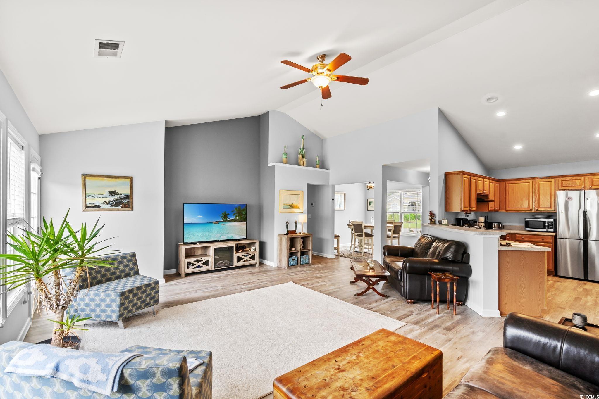 232 Marbella Drive Murrells Inlet, SC 29576 - Photo 8 of 40 Living area featuring light wood-style flooring, a