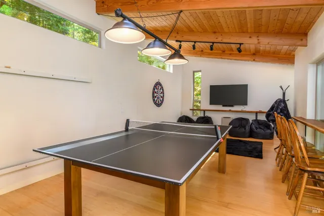 a view of a kitchen with a sink and a microwave