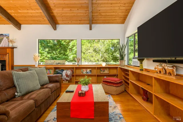 a balcony with seating area and furniture