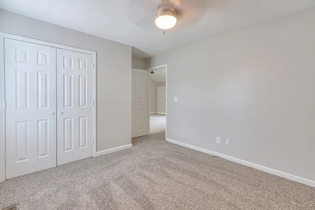 an empty room with a bathroom