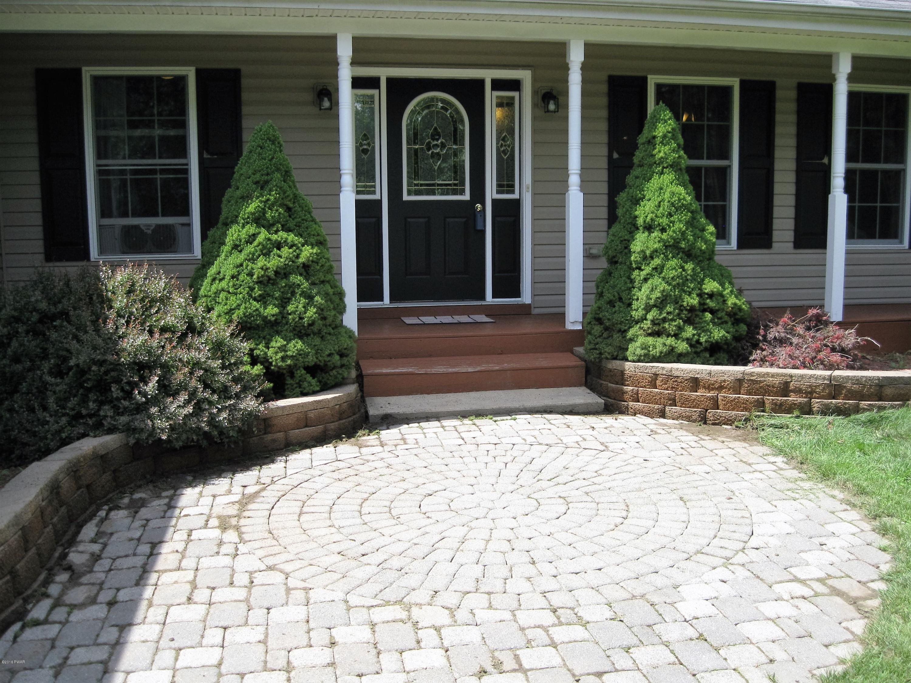 137 Caribou Road Dingmans Ferry, PA 18328 - Photo 3 of 34 a view of a entryway door front of house