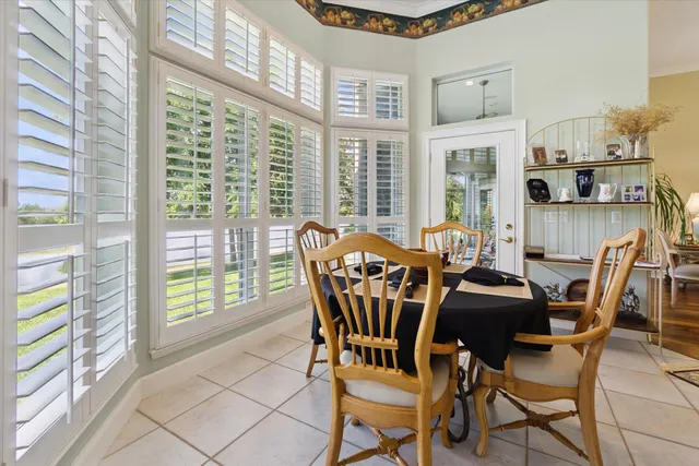 a spacious bedroom with a bed and furniture
