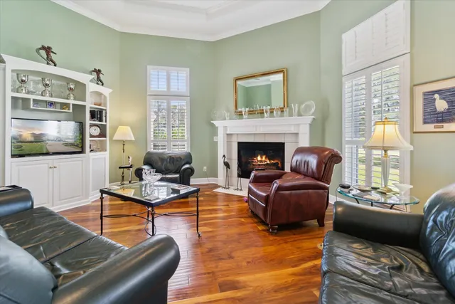 a view of a bathroom with a tub shower and mirror