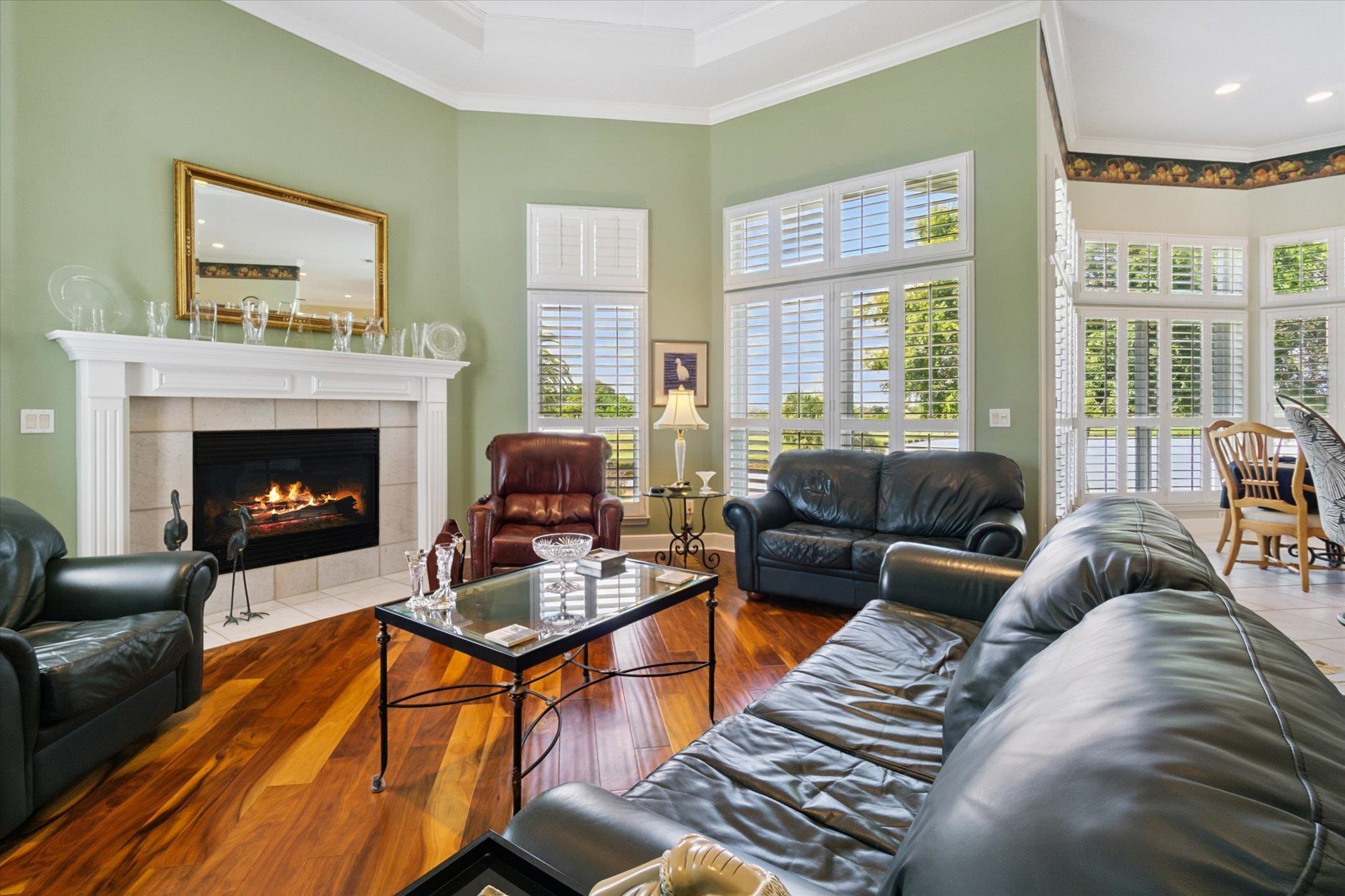 121 Marshside Drive St. Augustine, FL 32080 - Photo 24 of 71 a living room with furniture fireplace and a large window