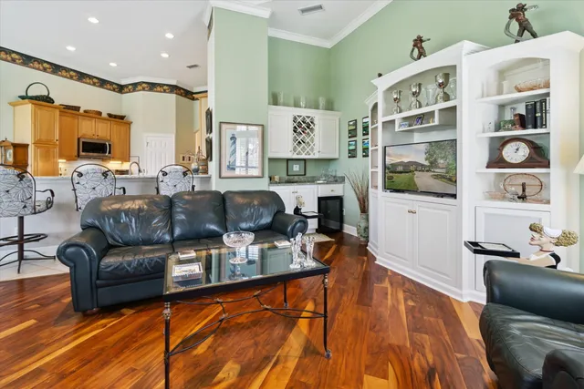 a spacious bathroom with a tub sink and mirror