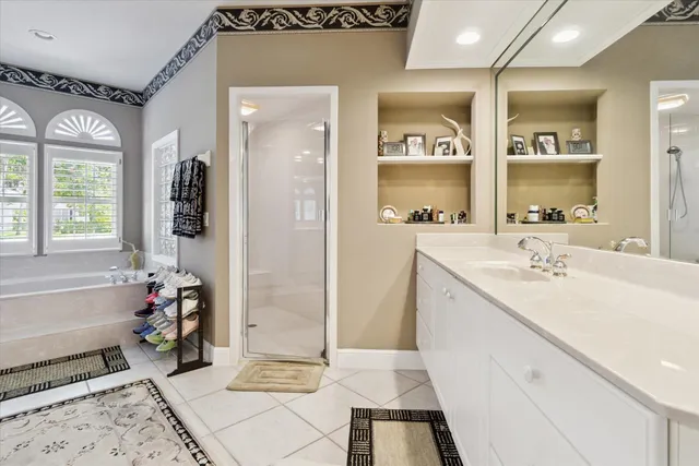 a living room with furniture and large window