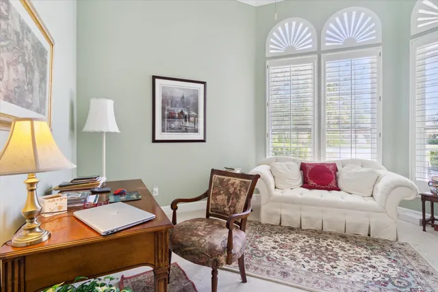 a view of a dining room with furniture window and outside view