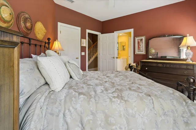 a view of a house with a big yard and garden