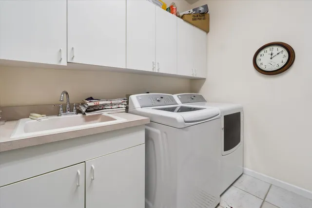 a view of a swimming pool with a outdoor seating