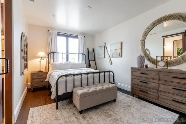 a bed room with a bed and a couch