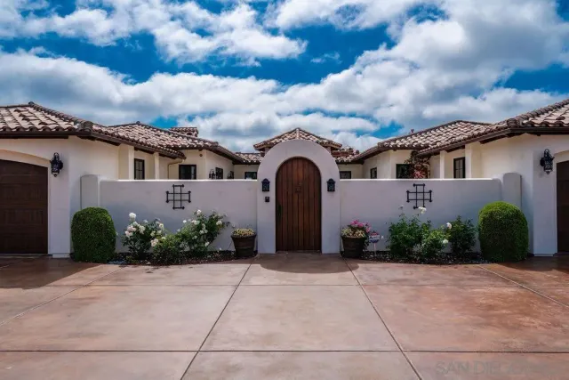 a living room with furniture fireplace and a flat screen tv