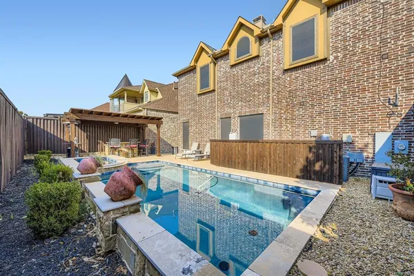 a view of house with outdoor seating space