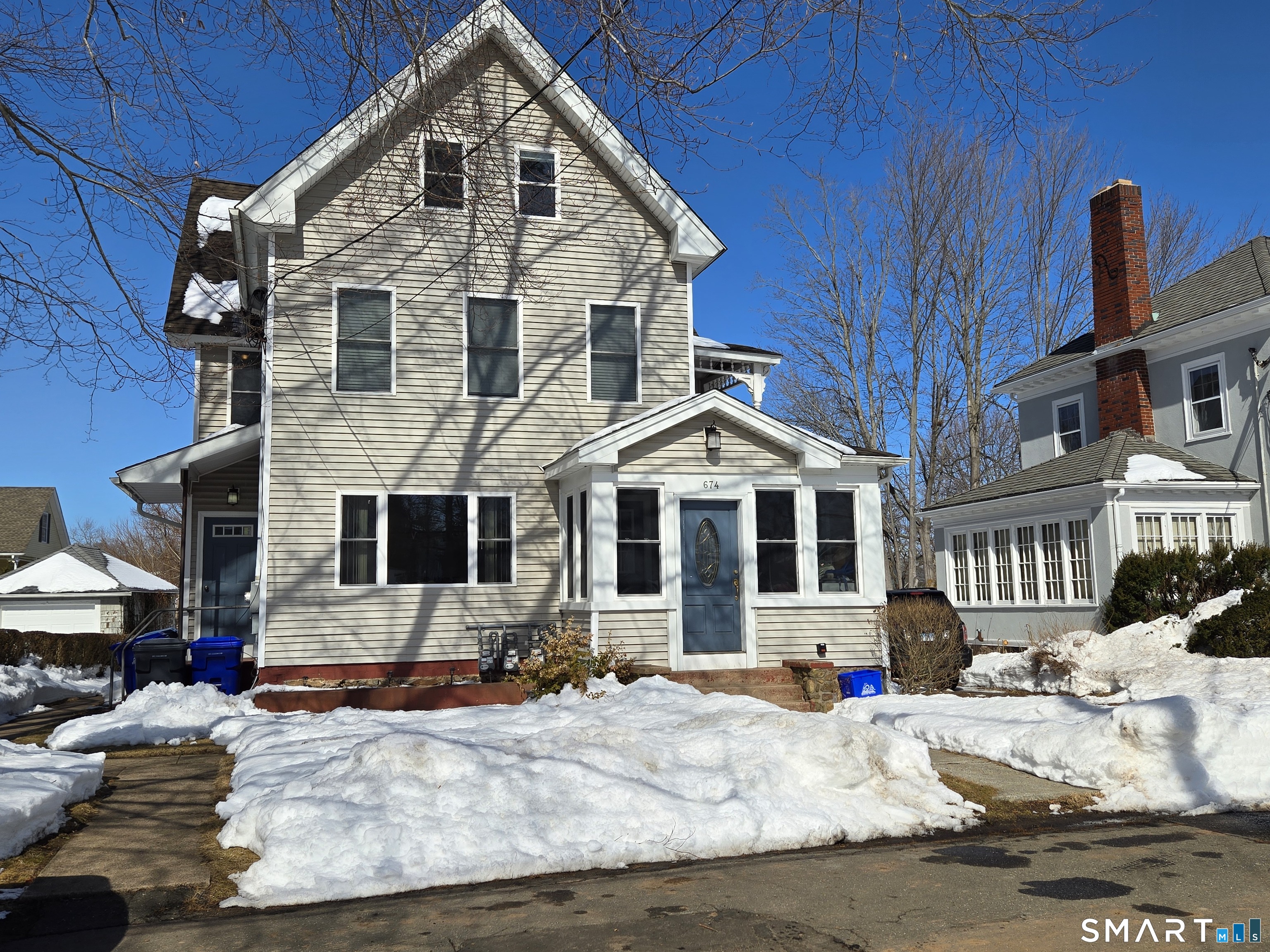 674 Main Street, Unit 3 Branford, CT 06405 - Photo 1 of 1 a front view of a house with a yard