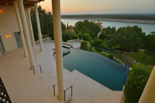 a view of balcony and yard