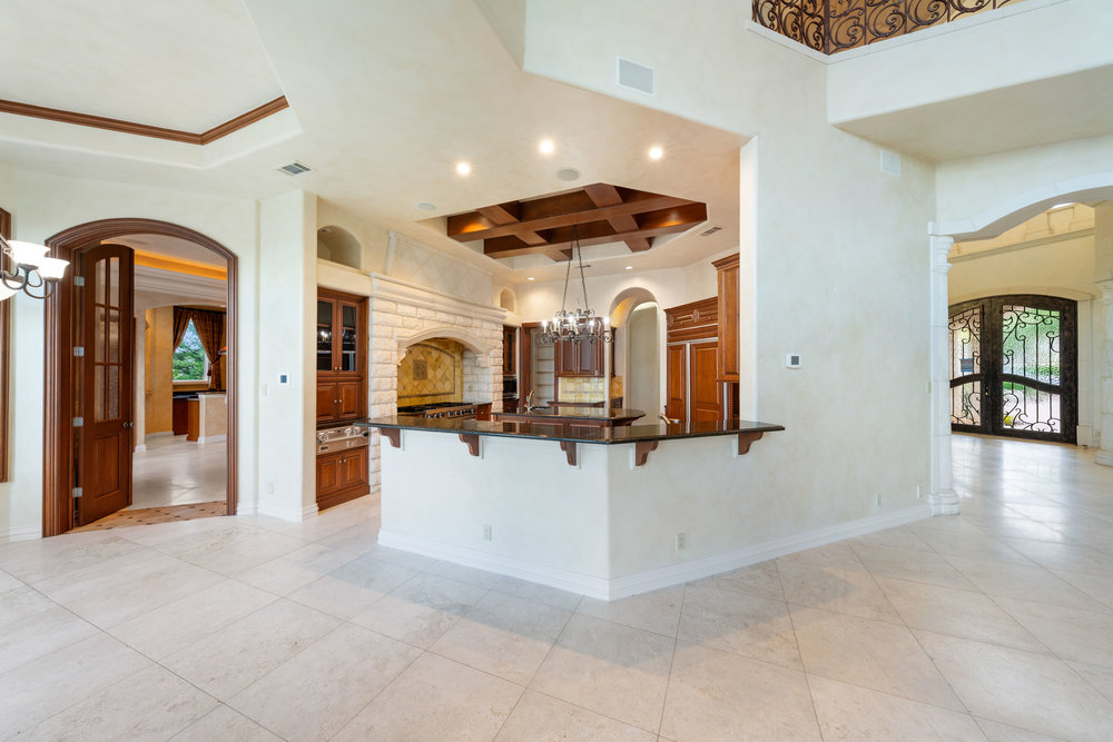 217 Bella Riva Drive Austin, TX 78734 - Photo 15 of 36 a view of a living room with chandelier