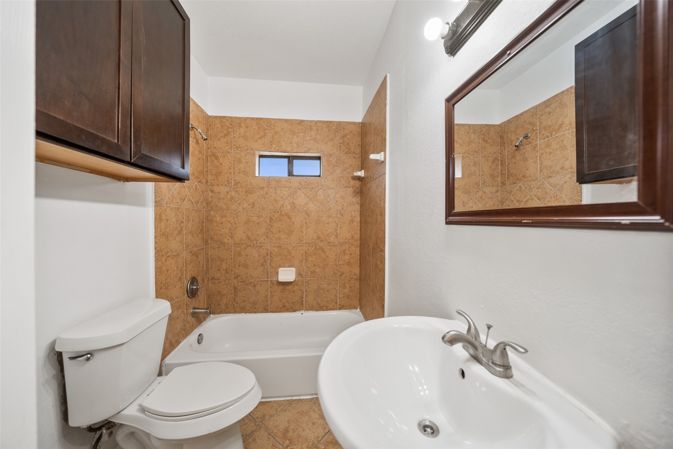406 Quitman Street, Unit 2 Houston, TX 77009 - Photo 14 of 22 a bathroom with a sink and a mirror
