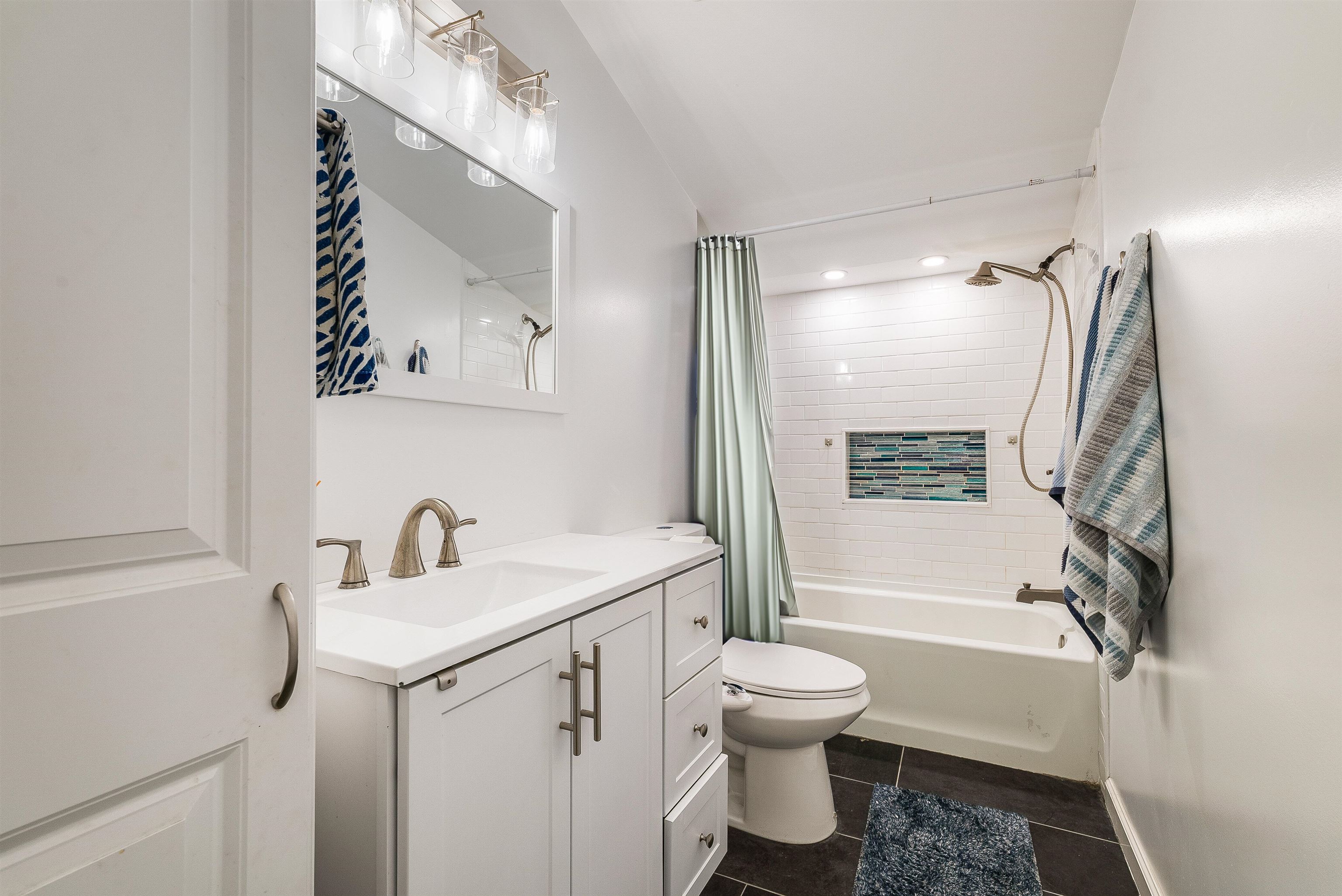 806 Randolph Street Staunton, VA 24401 - Photo 16 of 25 a bathroom with a sink toilet and shower