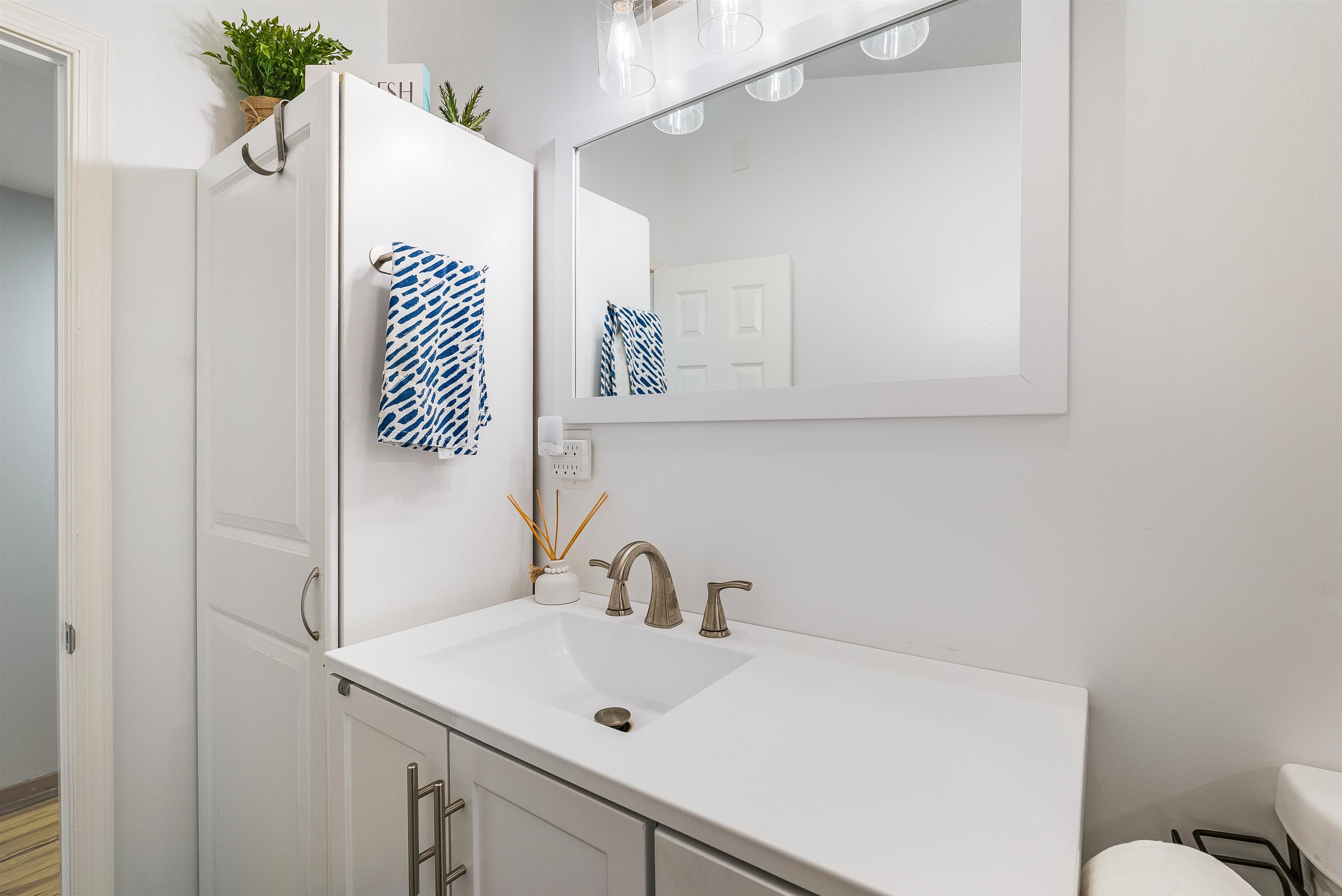 806 Randolph Street Staunton, VA 24401 - Photo 17 of 25 a bathroom with a sink and a mirror