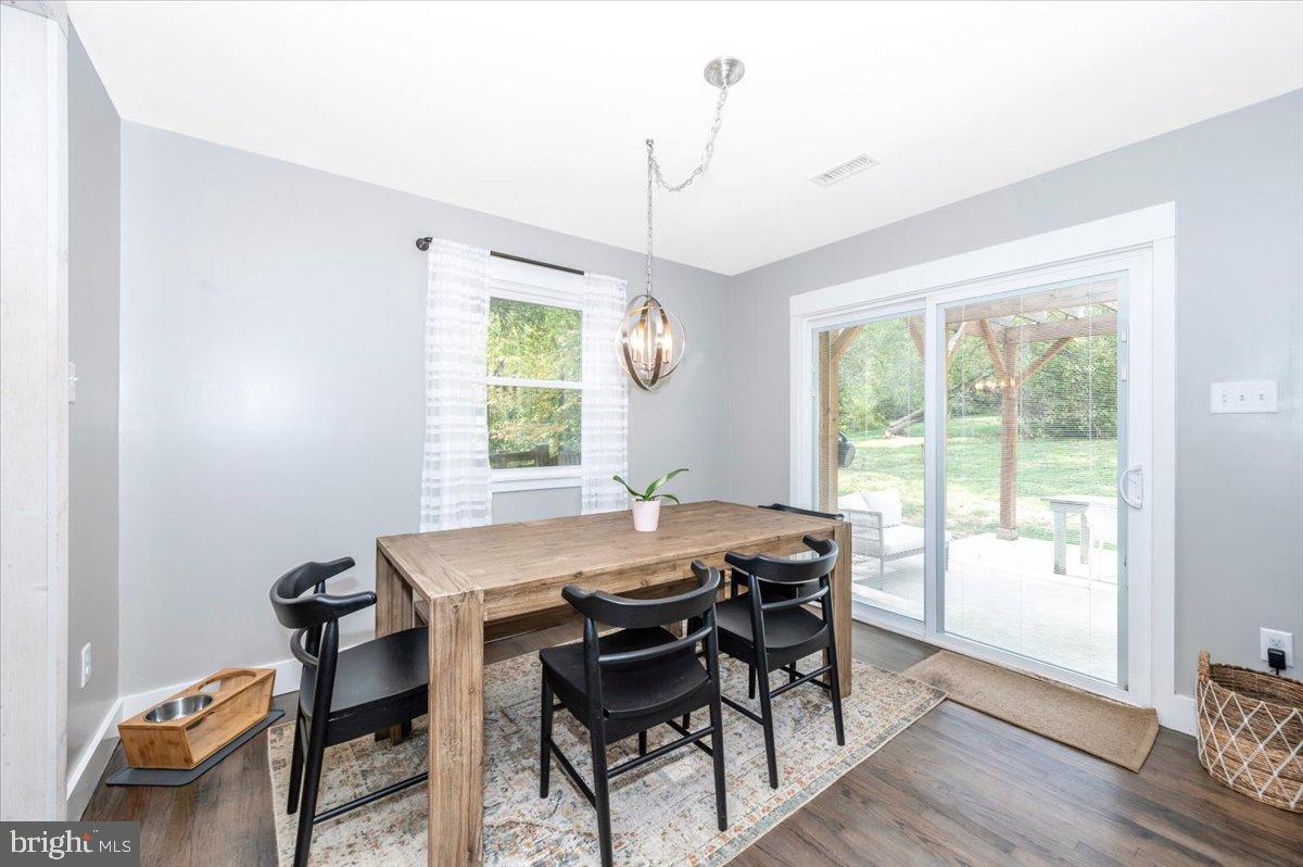 2710 Monument Road Myersville, MD 21773 - Photo 15 of 79 Bright dining space with serene outdoor views.