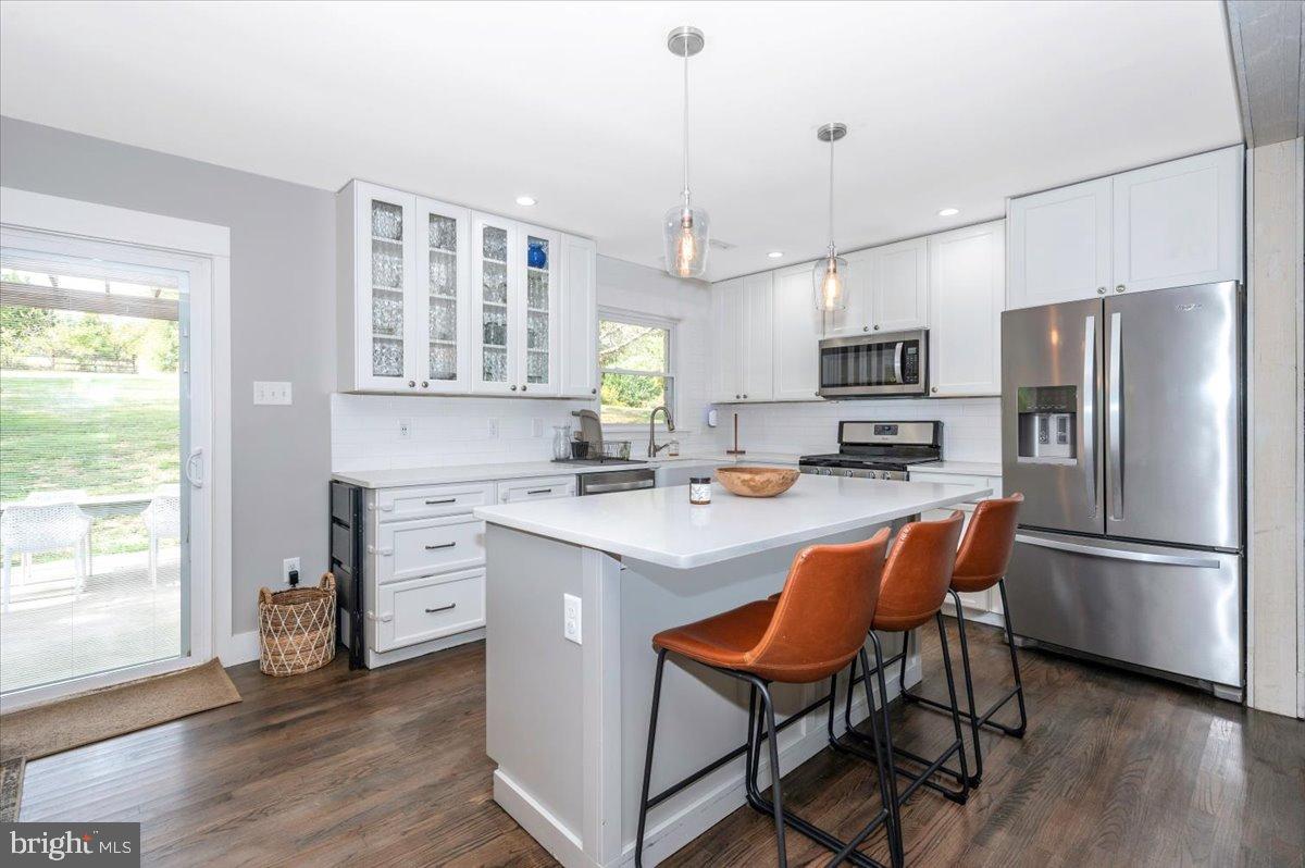 2710 Monument Road Myersville, MD 21773 - Photo 19 of 79 Modern kitchen with sleek design and light.