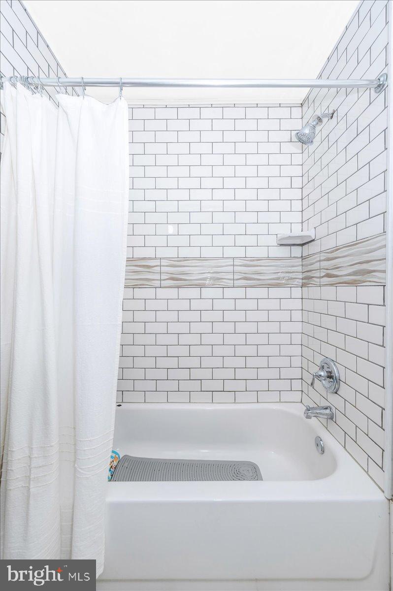2710 Monument Road Myersville, MD 21773 - Photo 34 of 79 Modern bathroom with classic tile design.