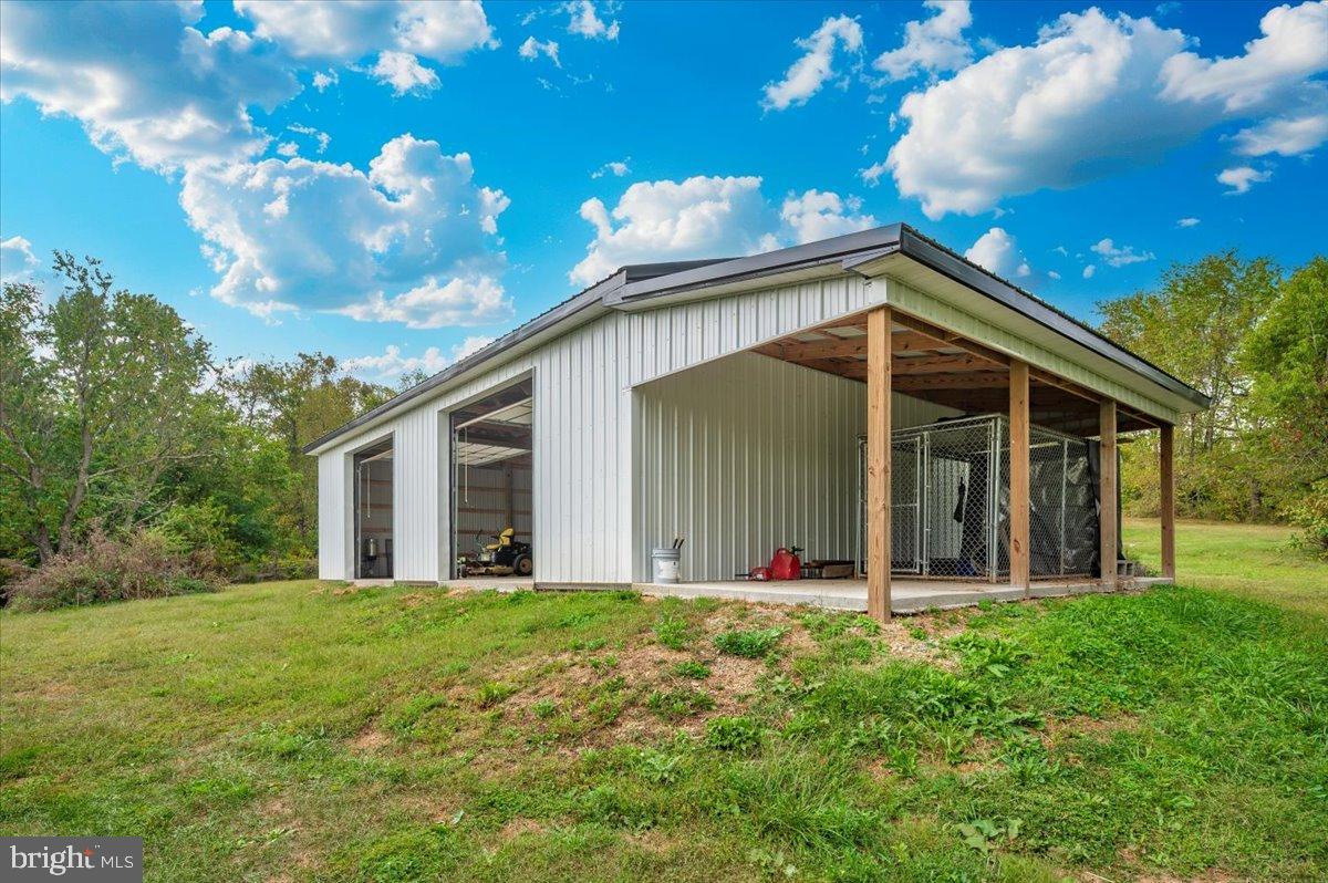 2710 Monument Road Myersville, MD 21773 - Photo 59 of 79 Modern barn-style structure on lush grounds.