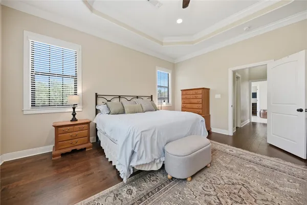 a bed room with a bed and a window